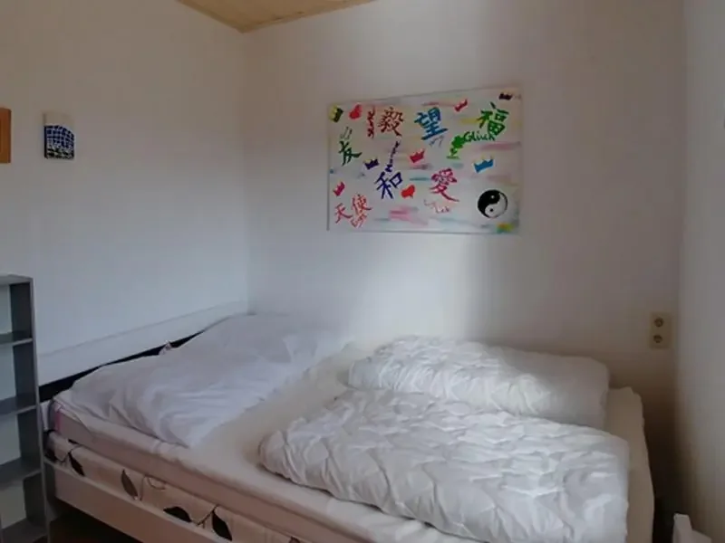 Bungalow 171 am Zeulenrodaer Meer – Schlafzimmer mit komfortablem Bett
